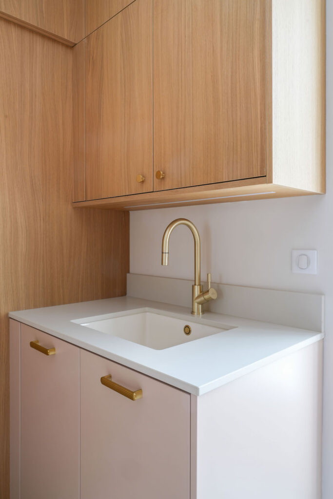 Kitchen sink with brass tap and oak wall units