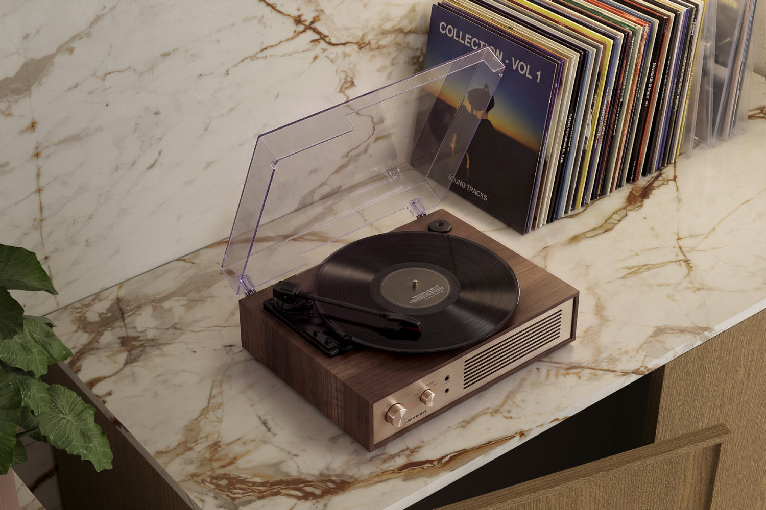 Piano cucina in marmo con vinile e dischi impilati